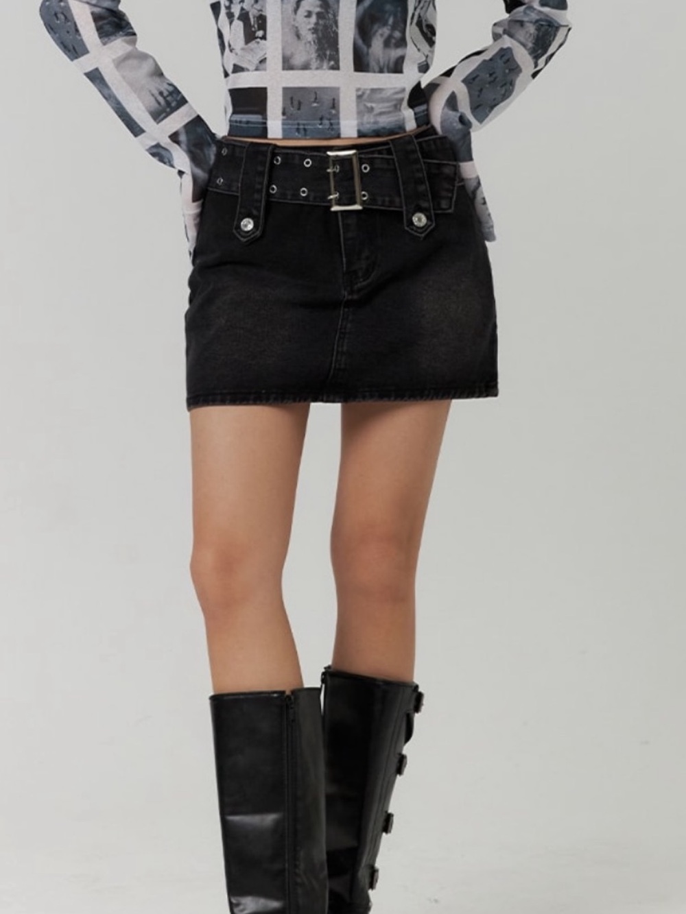 Belted black denim mini skirt
